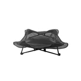 lit de camp chien noir
