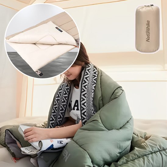 sac de couchage femme qui lit dans son sac